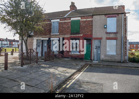 Derelict and boarded up houses in central Middlesbrough,England,UK Stock Photo