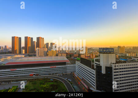 Liaoning, China - 29 August 2016: Sunrise of Shenyang cityscape with modern skyscrapers. Stock Photo