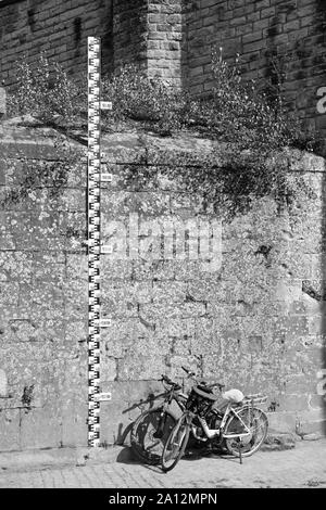 Luxembourg, Echternach, Bicycles parked by bridge across River Sure (the border with Germany) Stock Photo