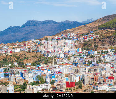 view of skyline of Chefchaouen, or Chaouen, is a city in the Rif Mountains of northwest Morocco. It’s known for the striking, blue-washed buildings Stock Photo