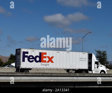 FedEx truck on 880 Freeway over alameda creek overpass, California