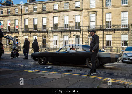 Vin Diesel's stand-in about to film a scene. Fast & Furious 9 has wrapped production in Edinburgh, after several weeks of filming for the latest movie in the high-octane car chase franchise. The last remaining scenes were shot today on Melville Street, a pretty Georgian terrace in the capital's West End. Stunt drivers, standing in for stars such as Vin Diesel, drove their muscle cars up and down the street, alongside camera vehicles. Fast & Furious 9 is due for release on 22 May 2020.