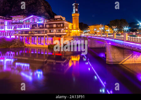 Amasya, Turkey - December 7, 2019 : Old Ottoman houses and clock tower view by the Yesilirmak River in Amasya City. Amasya is populer tourist destinat Stock Photo