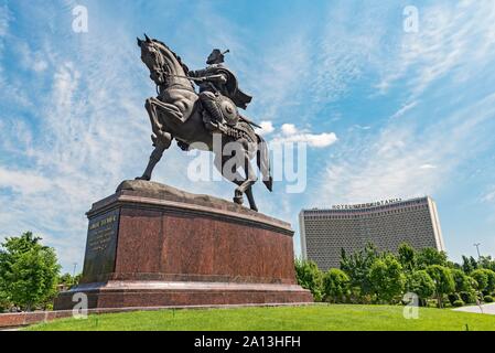 Amir Temur Statue and Hotel Uzbekistan building, Tashkent Stock Photo