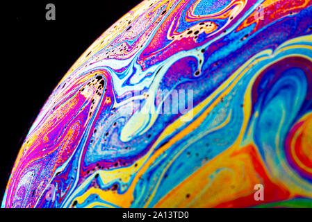 Beautiful psychedelic abstraction - interference in soap films in reflected light. Stock Photo