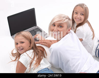 close up. mom and daughters use a laptop to view video files Stock Photo