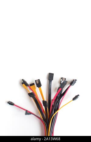 Red, black and yellow computer data cables. Data storage, network server infrastructure concept. Plenty of negative space. Stock Photo