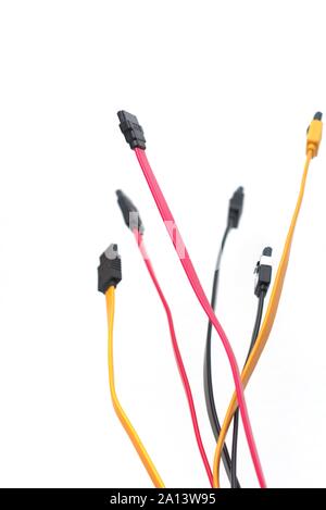 Red, black and yellow computer data cables. Data storage, network server infrastructure concept. Plenty of negative space. Stock Photo