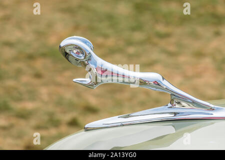 A leaping ram hood ornament on a classic Dodge automobile at the Montecito Motor Classic car show on the Santa Barbara Polo and Racquet Club Stock Photo