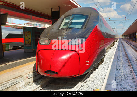 Red high speed Italian train in Naples station, Italy Stock Photo