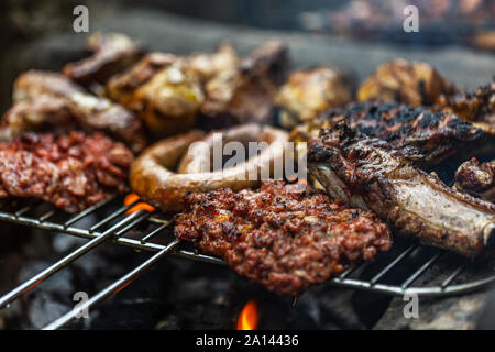 Barbeque grill mixed meat cooking on open air Stock Photo