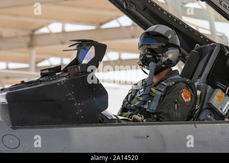 An F-16 pilot of the 310th Fighter Squadron prepares for another training sortie. Stock Photo