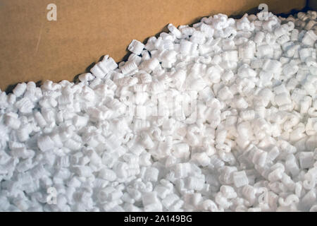 A large box of Styrofoam packing peanuts for shipping fragile items Stock Photo