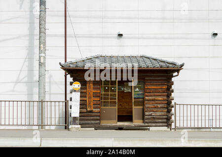 A log-cabin style bus-stop shelter inSugadaira, Ueda, Nagano, Japan. Stock Photo