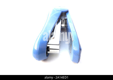 Blue stapler isolated on white background. Stock Photo