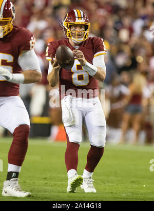 Washington Redskins quarterback Case Keenum (8) looks downfield as he takes a snap in the first quarter against the Washington Redskins at FedEx Field in Landover, Maryland on Monday, September 23, 2019.Credit: Ron Sachs/CNP | usage worldwide Stock Photo