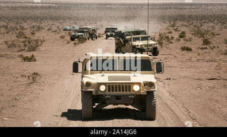 Convoy of humvees at Marine Corps Air Ground Combat Center, California. Stock Photo