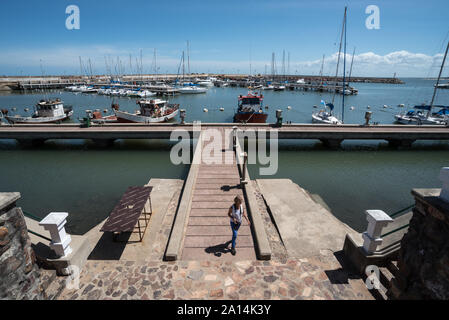 Piriapolis, Uruguay - March 4 2016: Harbor and marina with fishing boats and sailboats. Stock Photo