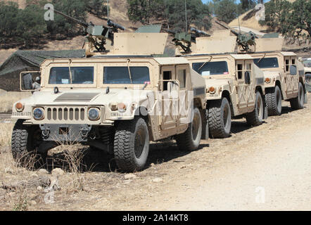 Convoy of Humvees at Fort Hunter Liggett, California. Stock Photo