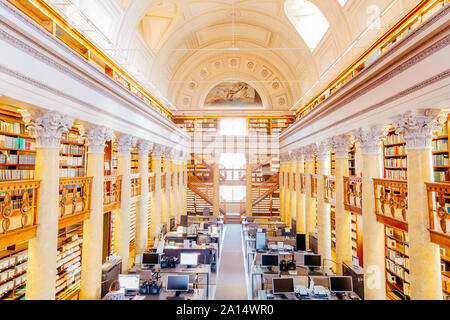 Helsinki Finland - September 19th 2019: National Library of Finland. Inside the building with book shelves and study tables. Photo from height. Stock Photo