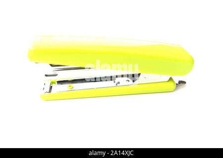 Green stapler isolated on white background. Stock Photo