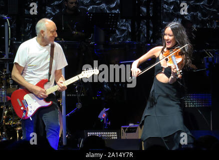 Tampa, United States. 22nd Sep, 2019. September 22, 2019 - Tampa, Florida, United States - Pete Townshend of the English rock band The Who performs with violinist Katie Jacoby at the Amalie Arena on the second leg of the band's Moving On! tour on September 22, 2019 in Tampa, Florida. Credit: Paul Hennessy/Alamy Live News Stock Photo
