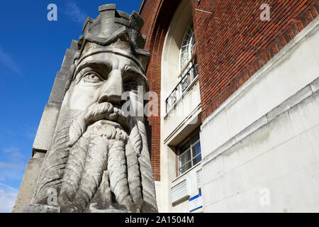 London, U.K. - Sept 23, 2019: One of the two colossal carved heads depicting Father Thames, sculpted by George Alexander, that sit at the southern ent Stock Photo