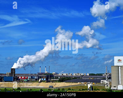 Smoke and steam power stacks and cement works ENCI Heidelburg North Sea Canal Netherlands Amsterdam Stock Photo