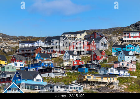 Colored houses on rocky hills in Qaqortoq, Greenland. Stock Photo