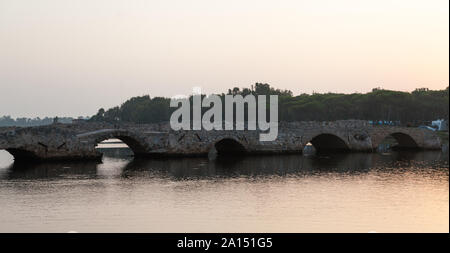 Roman Bridge over the  river calich in Northern Sardinia Stock Photo