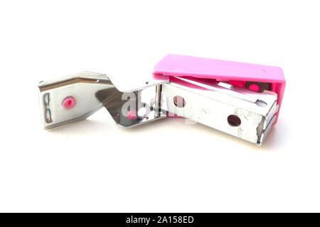 Small pink stapler isolated on white background. Stock Photo