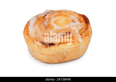 Studio shot of cinnamon flavoured iced bun isolated on a white background - John Gollop Stock Photo