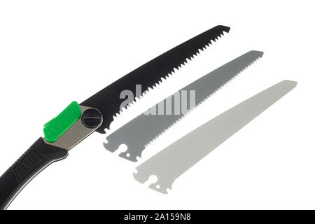 Folding handsaw and replaceable blades isolated on white Stock Photo
