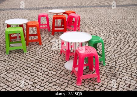 Little colored tables and seats for kids (Porto Santo, Madeira, Portugal) Stock Photo