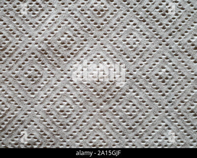 Close up of perforated kitchen paper with diamond pattern Stock Photo