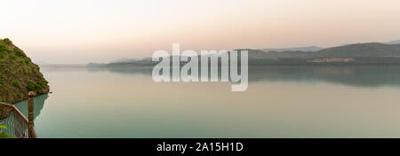 Panorama Tarbela Lake and Tarbela Dam wall from a distance Stock Photo