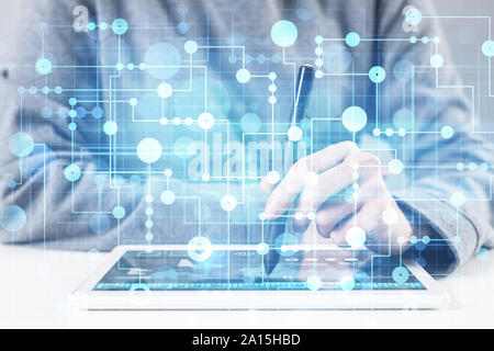 Project management and internet researching process. Man in business suit typing on laptop keyboard. Virtual geometric graphics with circle elements. Stock Photo