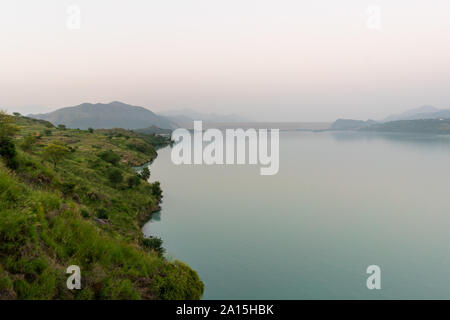 Tarbela Lake and Tarbela Dam wall from a distance Stock Photo