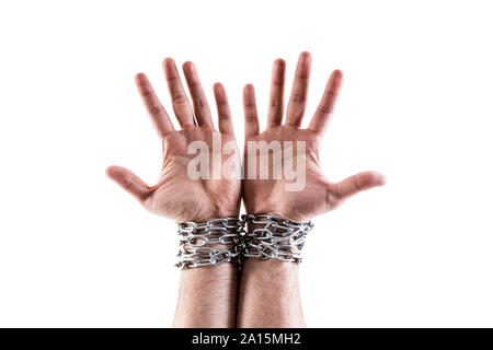 Two hands in chains isolated on white background with clipping path Stock Photo