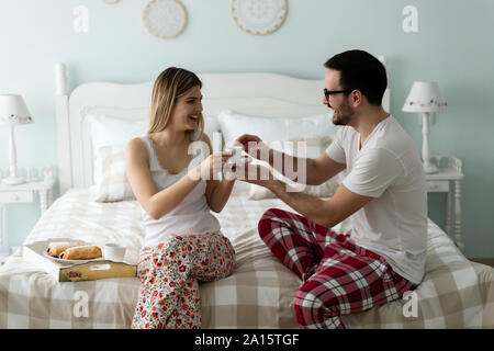 Picture of of happy young couple spending morning together Stock Photo