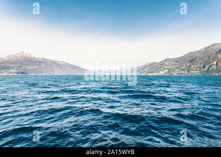 View of Lake Como and the Alps from Bellagio in winter, Italy Stock Photo