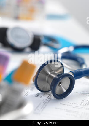 Health Screening, A stethoscope on a patients blood results after a a consultation Stock Photo