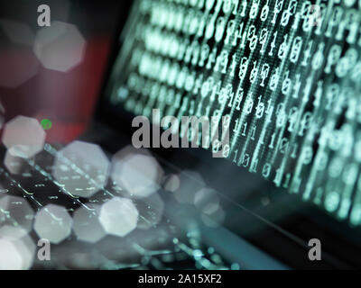 Cyber Attack, Fibre optics containing a virus infecting a computer Stock Photo