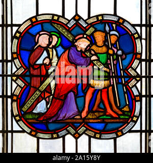 London, England UK. Church of St Michael, Cornhill. Stained glass window: Jesus carrying the cross Stock Photo