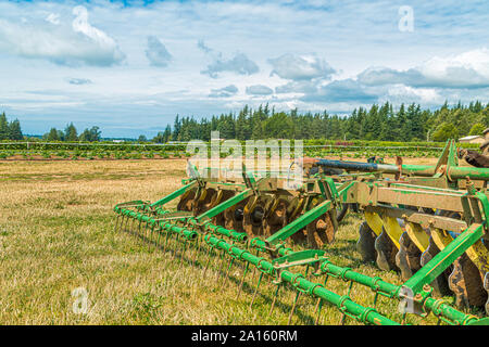 Modern Plow in Field Stock Photo