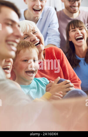 Three generations family having fun at home Stock Photo