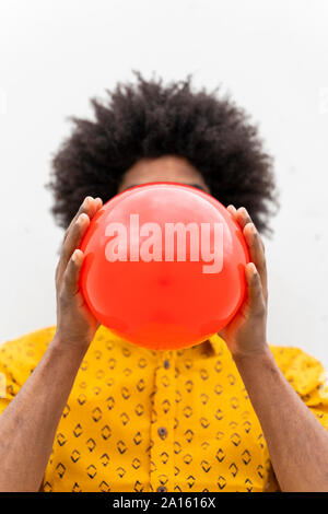 Young man wearing yellow shirt Stock Photo
