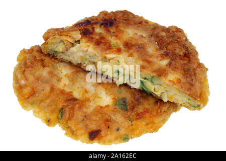 Fried vegetable pancakes from zucchini marrow  carrots onions and herbs. Isolated on white studio macro Stock Photo