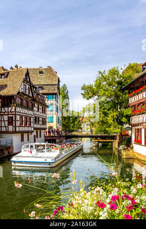 France, Strasbourg, Tour boat on Ill river in old town Stock Photo