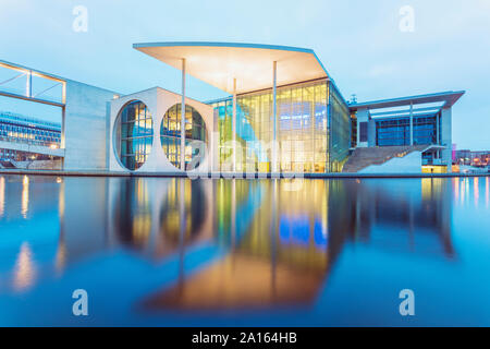 New buildings at the government quarter in Berlin at night, Germany Stock Photo